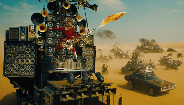 doof-warrior-playing-a-flame-throwing-guitar-in-mad-max-fury-road.jpg